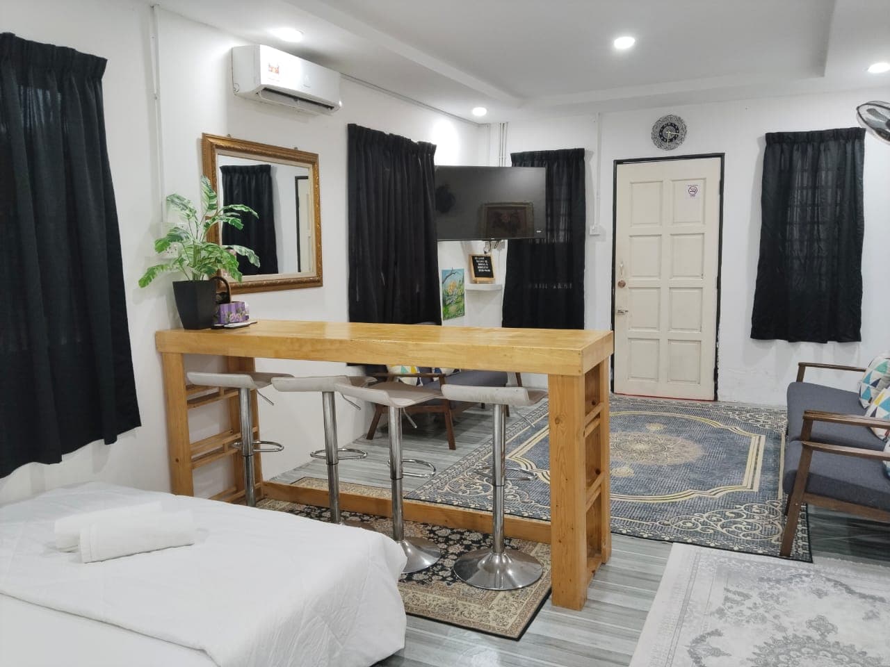 Living area with queen bed