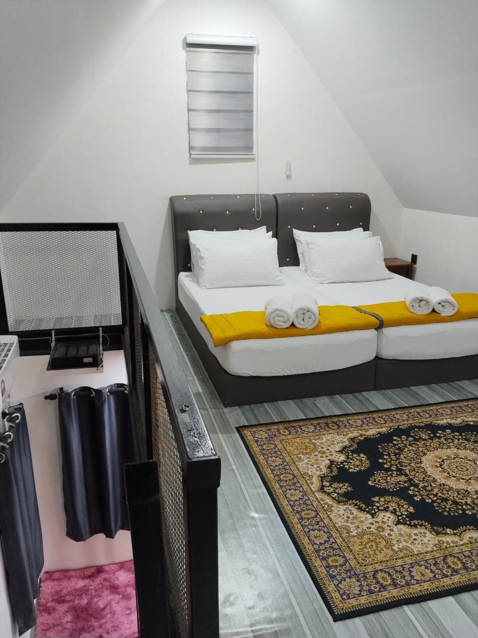 Tiny house upstairs bedroom